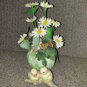 Ducks with flowers statue